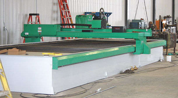 A & B has diversifed its operations from just pipeliners over the past half-century, and the new shop includes state-of-the-art fabrication equipment like this                 14’ x 24’ plasma table. 