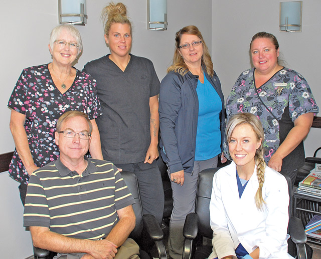 Dr. Leanne Ball has joined Dr. Rudosky in his Daysland and Forestburg practice as an associate. Pictured above, Back Row (from L to R): Glynis, Jen, Sherry, and Terry-lynn, all members of the clinic staff. Front row: Dr. Brian Rudosky, and Dr. Leanne Ball.