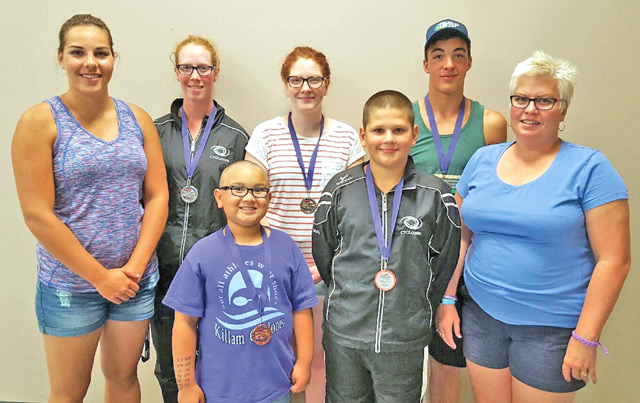 Pictured above are the four medal winners from the Killam Cyclones Swim Meet and their coaches.  Back Row is Denita Yuzik, Silver, Coach and swimmer Jo-anne Yuzik, Gold, Matthew Pfeffer, Gold.  Front is coach Cassidy Pfeffer, Braelan Carrigan, Bronze, Tyler Krys, Bronze, and coach Christine Kinzer.