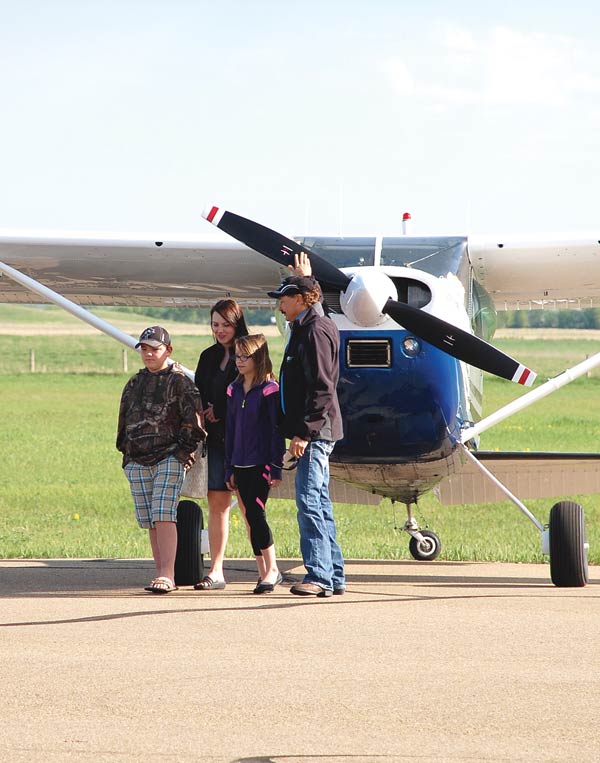 Every participant received a framed photo of their pilot and his plane as a momento of their flight.