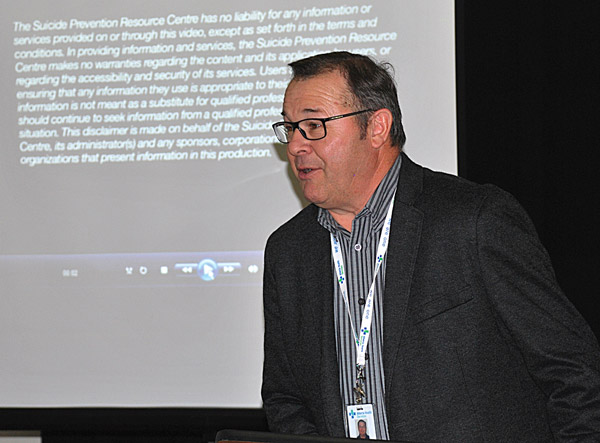 Neil Harris from Alberta Health Services introduces a video presentation called, “Too tough to talk about it” during a Mental Health Fair in Hardisty.