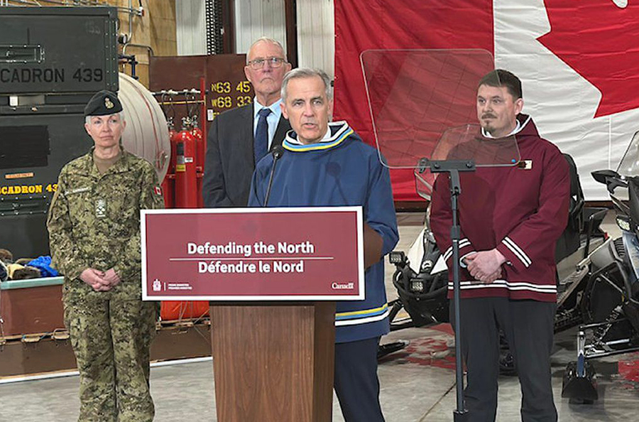 Prime Minister Mark Carney's first trip within Canada brought him to Iqaluit on March 18. From left, Chief of Defence Staff Gen. Jennie Carignan, Defence Minister Bill Blair, Prime Minister Mark Carney and Nunavut Premier P.J. Akeeagok. Kira Wronska Dorward/NNSL photo Kira Wronska Dorward, Local Journalism Initiative Reporter