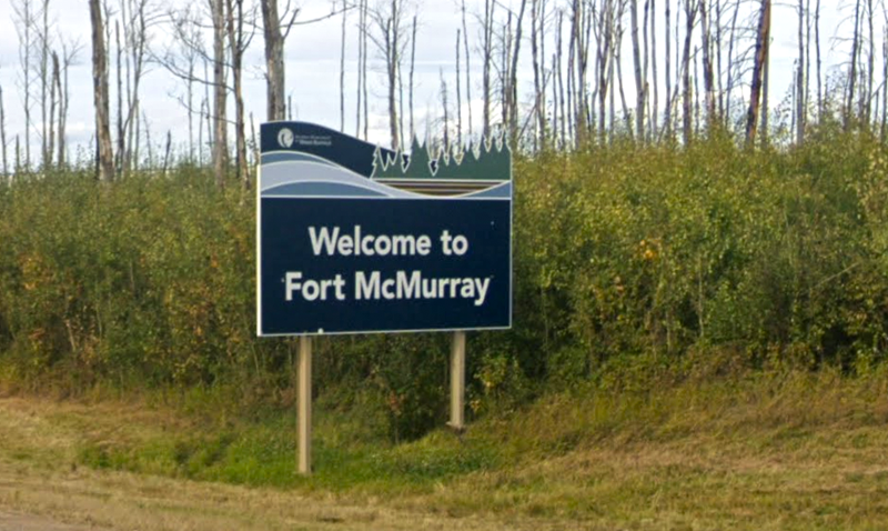 Fort McMurray neighbourhoods evacuating again to escape wildfire