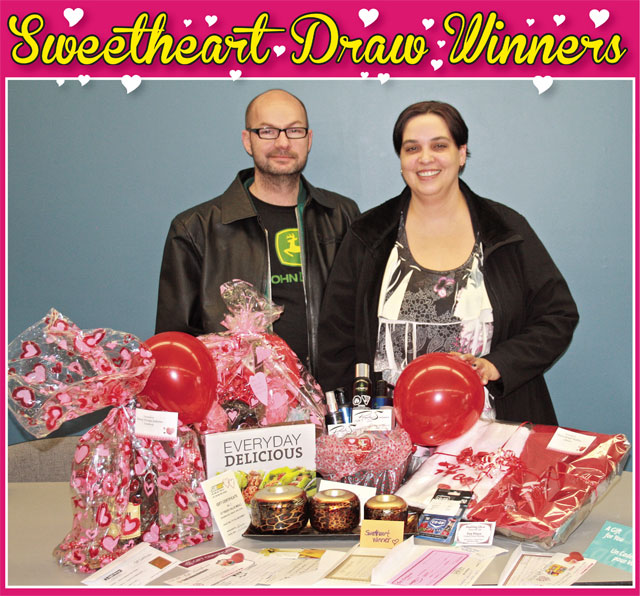 Shawn Slavik and Christie Willis of Killam had their names drawn to become the 31st annual Sweethearts. Christie entered Shawn’s name at a number of participating businesses, so she wasn’t sure which might have been the winning entry. The pair say they already enjoy all that Flagstaff has to offer, and recently they took in the Friends of the Battle River Rail Sausage supper ride to Heisler. As the winners, the two picked up more than $350 in gift certificates as well as prizes and prize baskets as shown above.The couple say they are looking forward to visiting all the participating stores in Flagstaff, and finding some new favourites in the process. They will enjoy a gift certificate from Wild Rose Co-op Sedgewick and Killam Food Stores; a gift certificate from Budding Ideas and Paw Prints, Killam; a gift certificate from The Wooden Spoon, in Sedgewick; a gift certificate from Status Hair, in Killam; a gift certificate from Killam Liquor Store; a gift certificate from Jerry’s Pharmacy, Daysland; a gift basket from Many Horses Saloon, Forestburg; a gift card from Guardian Drugs, Killam; a gift certificate from Apple Drugs/The Source, Forestburg; a trio of candle holders from Home Hardware, Killam; a gift basket of products from Purple Scissor Salon in Daysland; a gift certificate from Coutts Home Hardware in          Forestburg; a gift certificate for a dinner for two from the Heisler Cafe; Dinner for two gift certificate from Subway, Killam; a gift certificate from Brandywine and Brew, Sedgewick; a gift certificate from Floral Scents, Daysland; a gift basket  from Mrs. T’s Liquor Store in Alliance; a gift certificate from the Stop Spot, Killam; a gift card from Underground Hair, Killam; a gift certificate from Dream Creations, Hardisty; a pair of monogrammed his-and-hers towels from Main Street Medley, Alliance; and a one-year subscription to The Community Press, along with an ATCO Everyday Delicious limited edition cookbook. This is the 31st year The Community Press has hosted the Sweethearts Draw, and every year the number of entries and participants grows. 